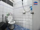 Bathroom with tiled walls and floor