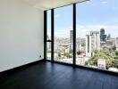 Modern living room with large window and city view