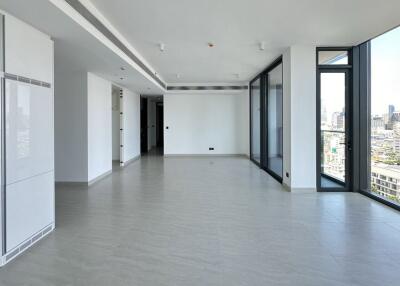 Spacious modern living room with large windows