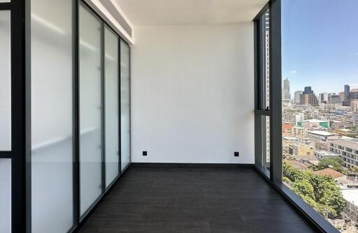 Modern room with large windows and city view