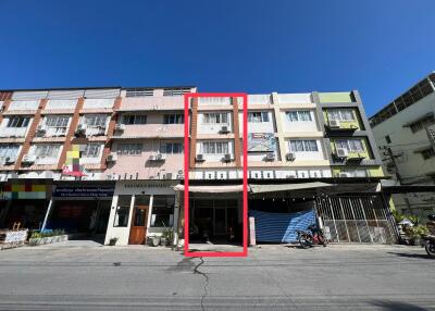 Three-story commercial building façade