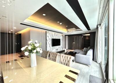 Modern living room with dining area and elegant decor