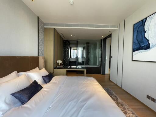 Modern bedroom with luxurious decor and ensuite bathroom