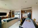 Spacious living room with adjacent modern kitchen