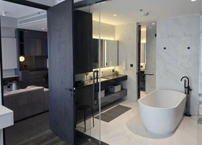 Modern bathroom with bathtub and double vanity