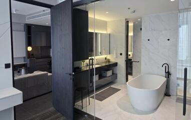 Modern bathroom with bathtub and double vanity