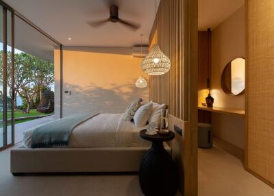 Modern bedroom with a large glass wall, cozy bed, and decorative elements.