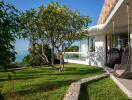 Modern house with large windows and garden view