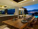 Luxurious dining area with a large wooden table and pool view