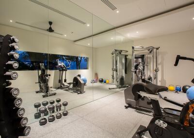 Spacious home gym with modern equipment