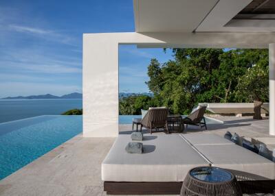 Luxury outdoor living space with infinity pool and ocean view