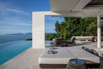 Luxury outdoor living space with infinity pool and ocean view