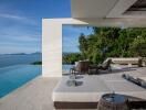 Luxury outdoor living space with infinity pool and ocean view