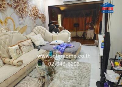 Luxurious living room with ornate decor and comfortable seating