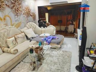 Luxurious living room with ornate decor and comfortable seating