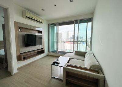 Modern living room with glass balcony doors