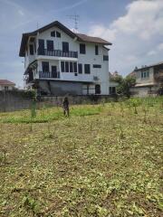 Exterior view of building with garden