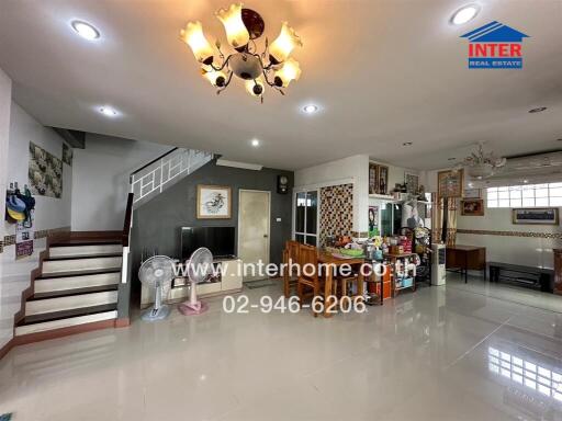 Spacious main living area with staircase