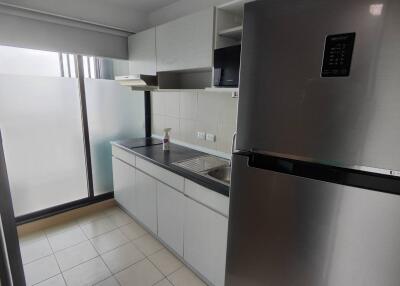 Modern kitchen with stainless steel appliances