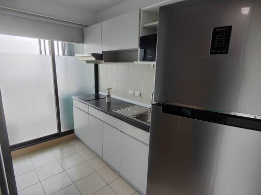 Modern kitchen with stainless steel appliances