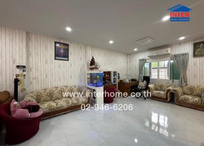 Spacious living room with elegant decor and ample seating