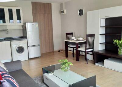 Modern living room with integrated kitchen and dining area