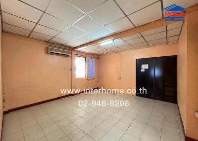 Bedroom with window, air conditioner, and wardrobe