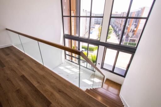 Modern stairway with large windows