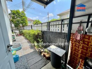 Outdoor space with garden and utility area