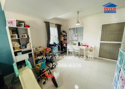 Living area with dining space and children