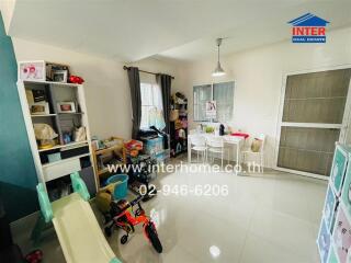 Living area with dining space and children