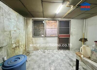 Kitchen with old style furnishing and tiled floor