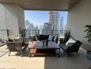 Modern balcony with city view and outdoor seating