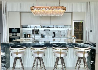 Modern kitchen with island and pendant lighting