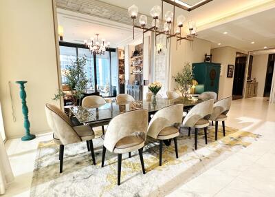 Luxurious dining room with a large dining table and modern chairs