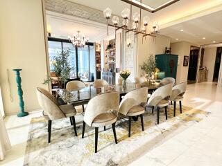 Luxurious dining room with a large dining table and modern chairs