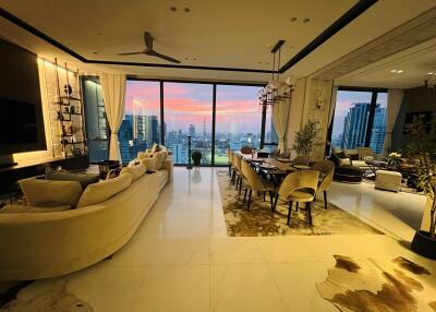 Spacious living and dining area with city view