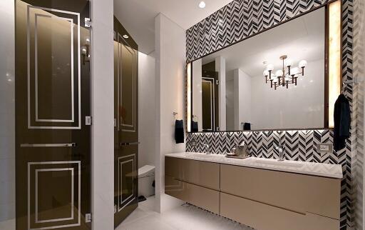 Modern bathroom with large mirror and stylish wall tiles