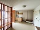 Minimalist kitchen with wooden furnishings and open layout