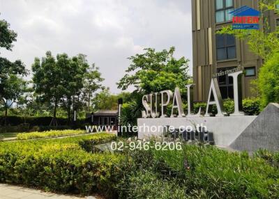 Exterior view of the Supalai building with garden