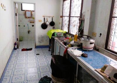 Kitchen with a view of the bathroom