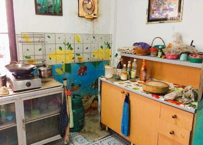 Old kitchen with various utensils and decorations