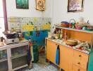 Old kitchen with various utensils and decorations