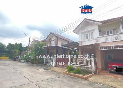 Exterior view of residential buildings with driveways