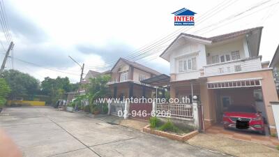 Exterior view of residential buildings with driveways