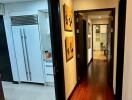 Modern hallway with view of kitchen and living area