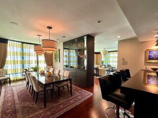 Spacious dining area with a large table and modern decor