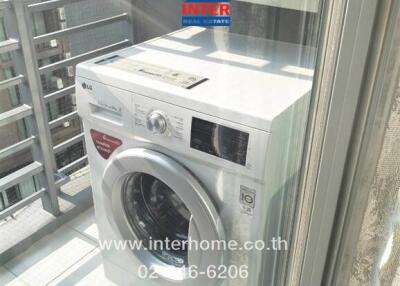 Outdoor laundry space with washing machine and air conditioning unit