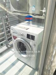 Outdoor laundry space with washing machine and air conditioning unit