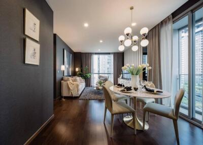 A modern, well-lit living room with dining area